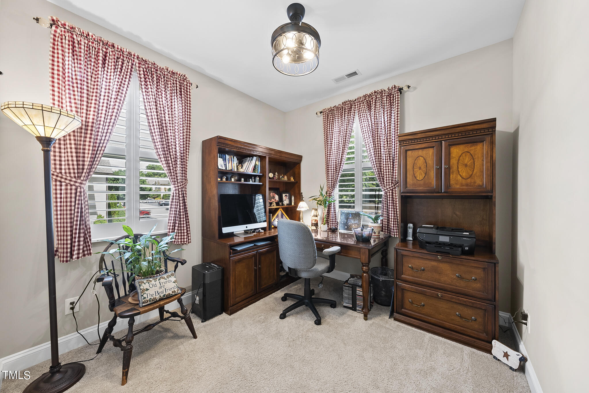 699 Wickham Ridge Road Apex, NC 27539 - Photo 28 of 36 a workspace with furniture and a window