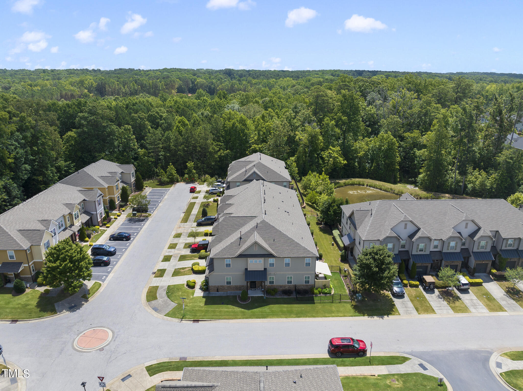 699 Wickham Ridge Road Apex, NC 27539 - Photo 35 of 36 an aerial view of a house with yard swimming pool and outdoor seating