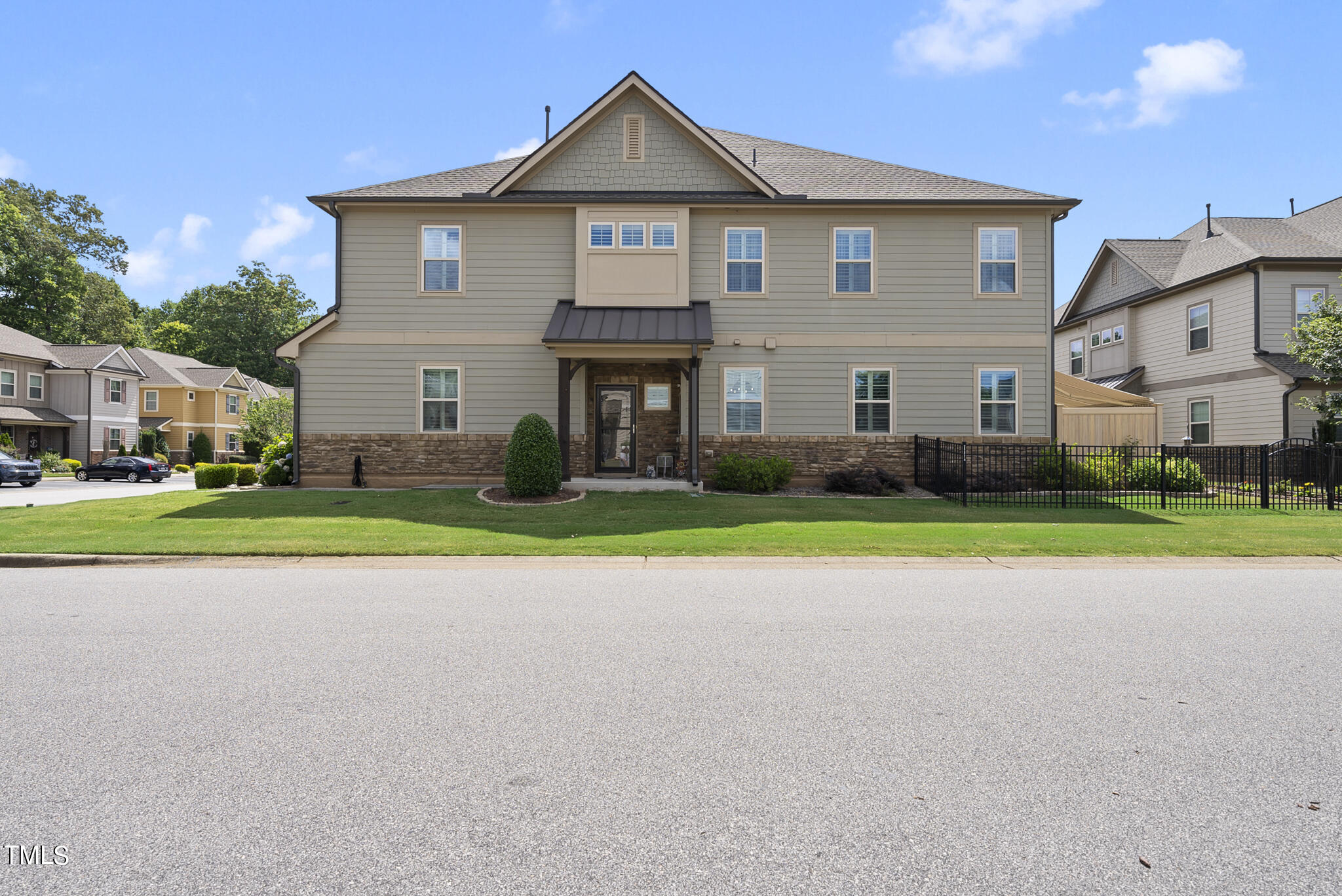 699 Wickham Ridge Road Apex, NC 27539 - Photo 4 of 36 a view of house with a yard
