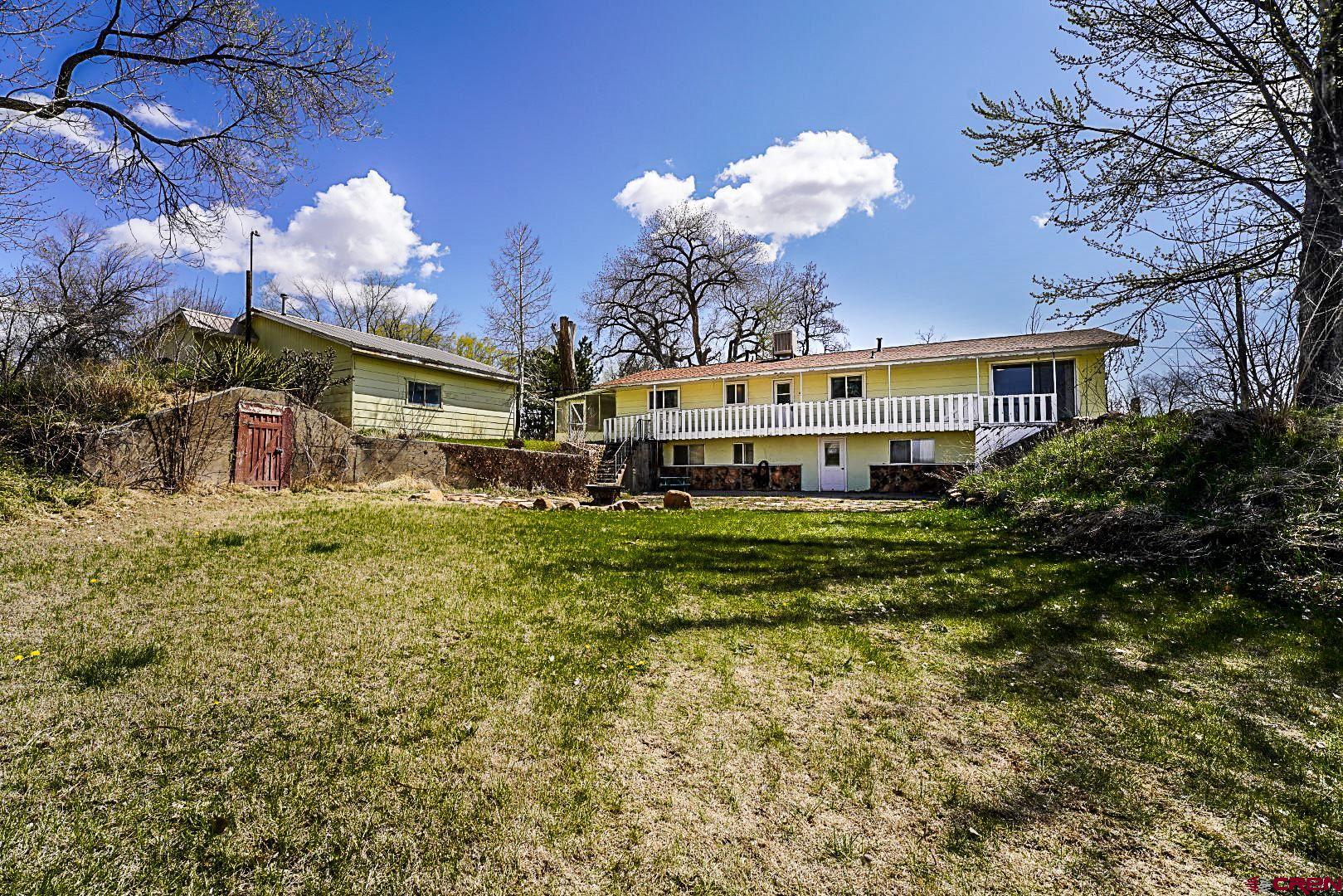 2326 I Road Grand Junction, CO 81505 - Photo 15 of 33 a view of a house with a big yard