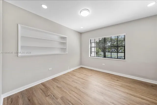 a view of a room with racks on the wall