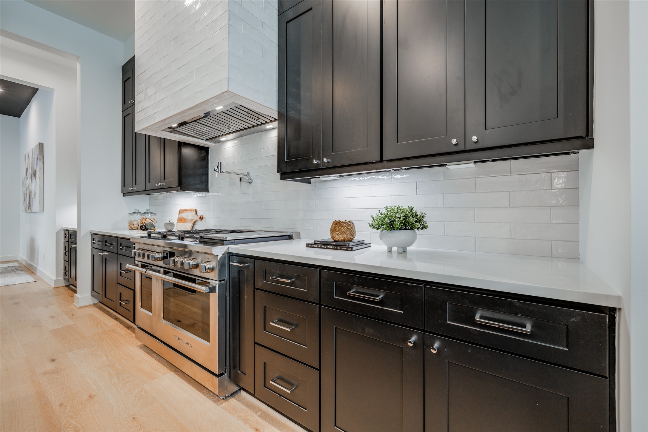 1824 Marshall Street Houston, TX 77098 - Photo 18 of 45 a kitchen with stainless steel appliances granite countertop a sink stove and microwave