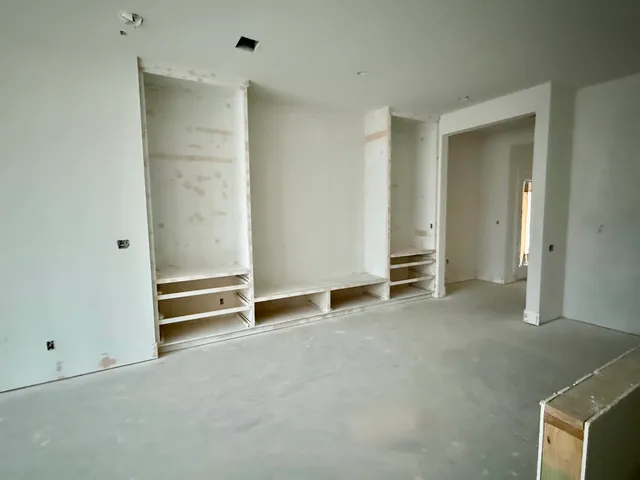 an empty room with windows