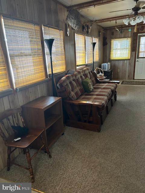 9916 Golf Course Road, Unit 61 Ocean City, MD 21842 - Photo 8 of 18 a living room with furniture and a large window