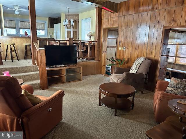 9916 Golf Course Road, Unit 61 Ocean City, MD 21842 - Photo 9 of 18 a living room with furniture and a flat screen tv