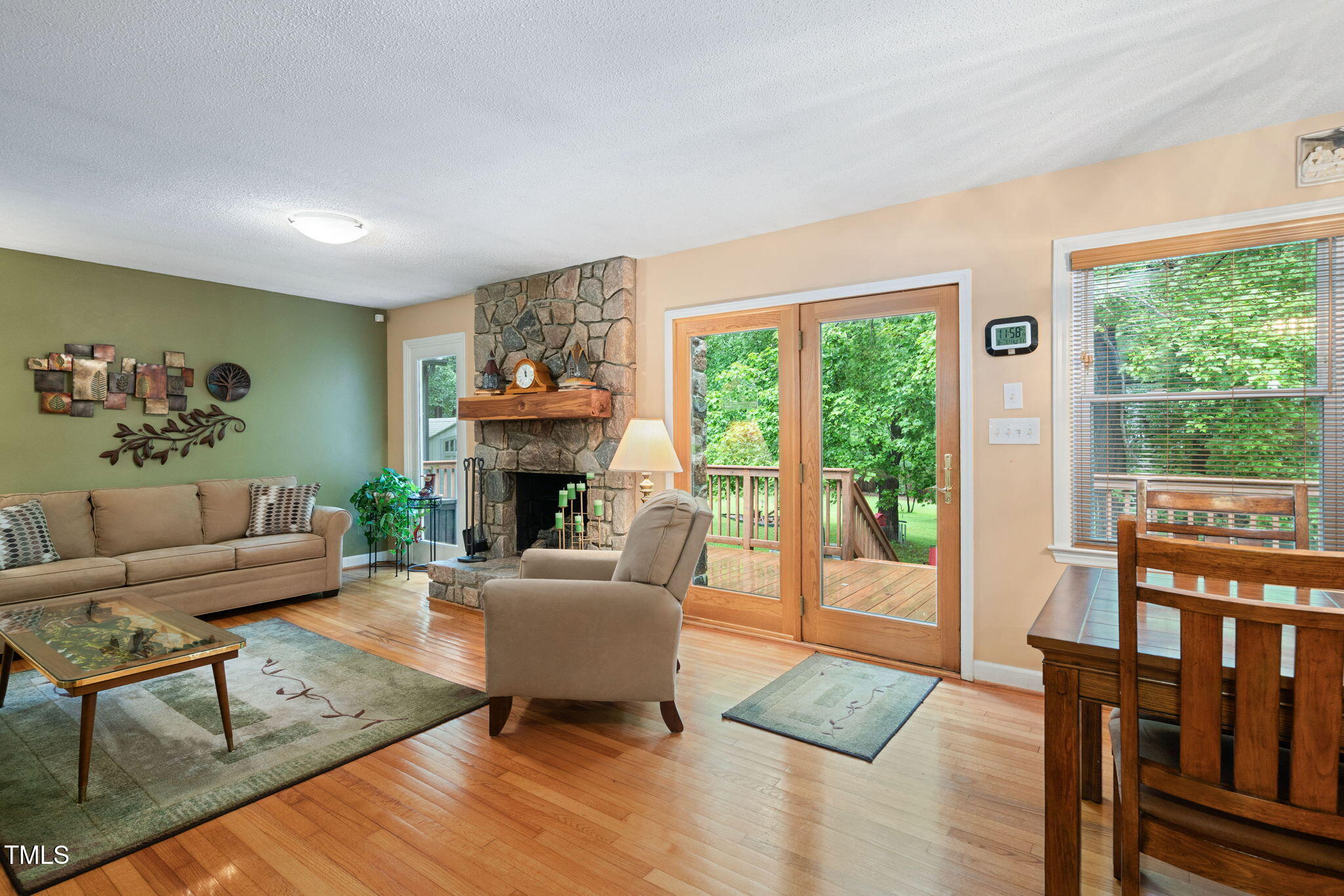 8236 Jackson Road Wake Forest, NC 27587 - Photo 11 of 74 a living room with furniture and a fireplace