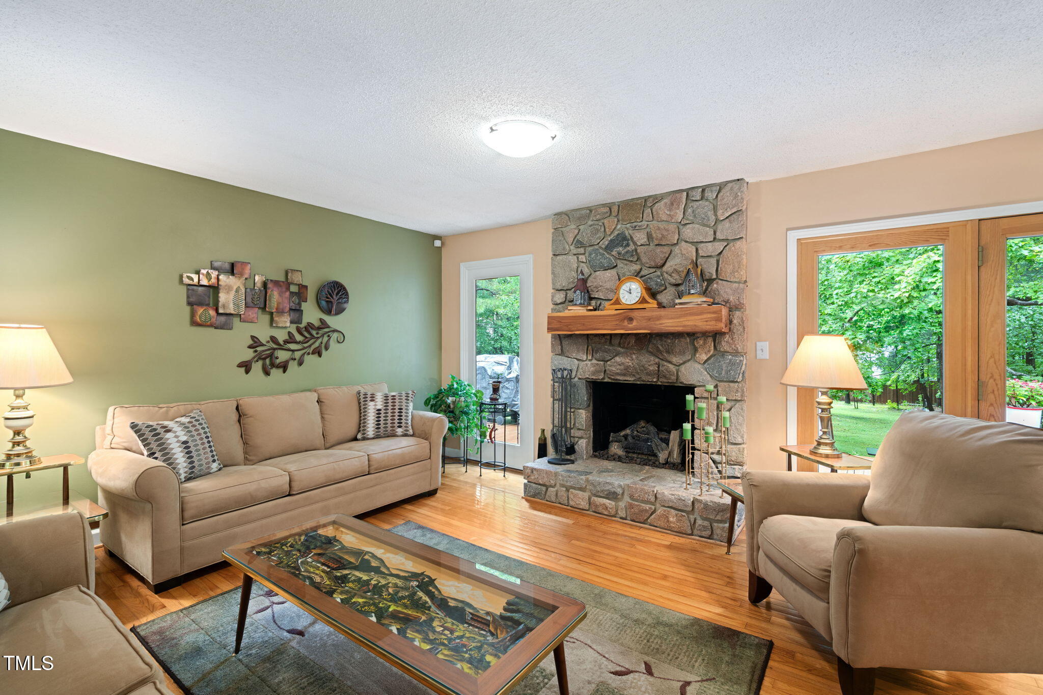 8236 Jackson Road Wake Forest, NC 27587 - Photo 14 of 74 a living room with furniture and a fireplace