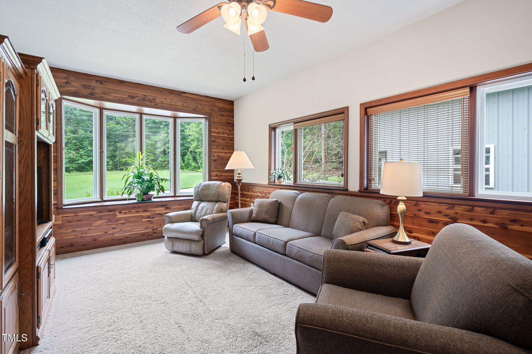 8236 Jackson Road Wake Forest, NC 27587 - Photo 19 of 74 a living room with furniture and a large window