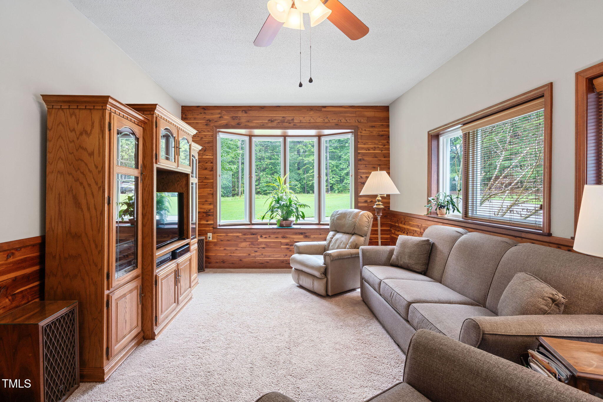 8236 Jackson Road Wake Forest, NC 27587 - Photo 20 of 74 a living room with furniture and a large window