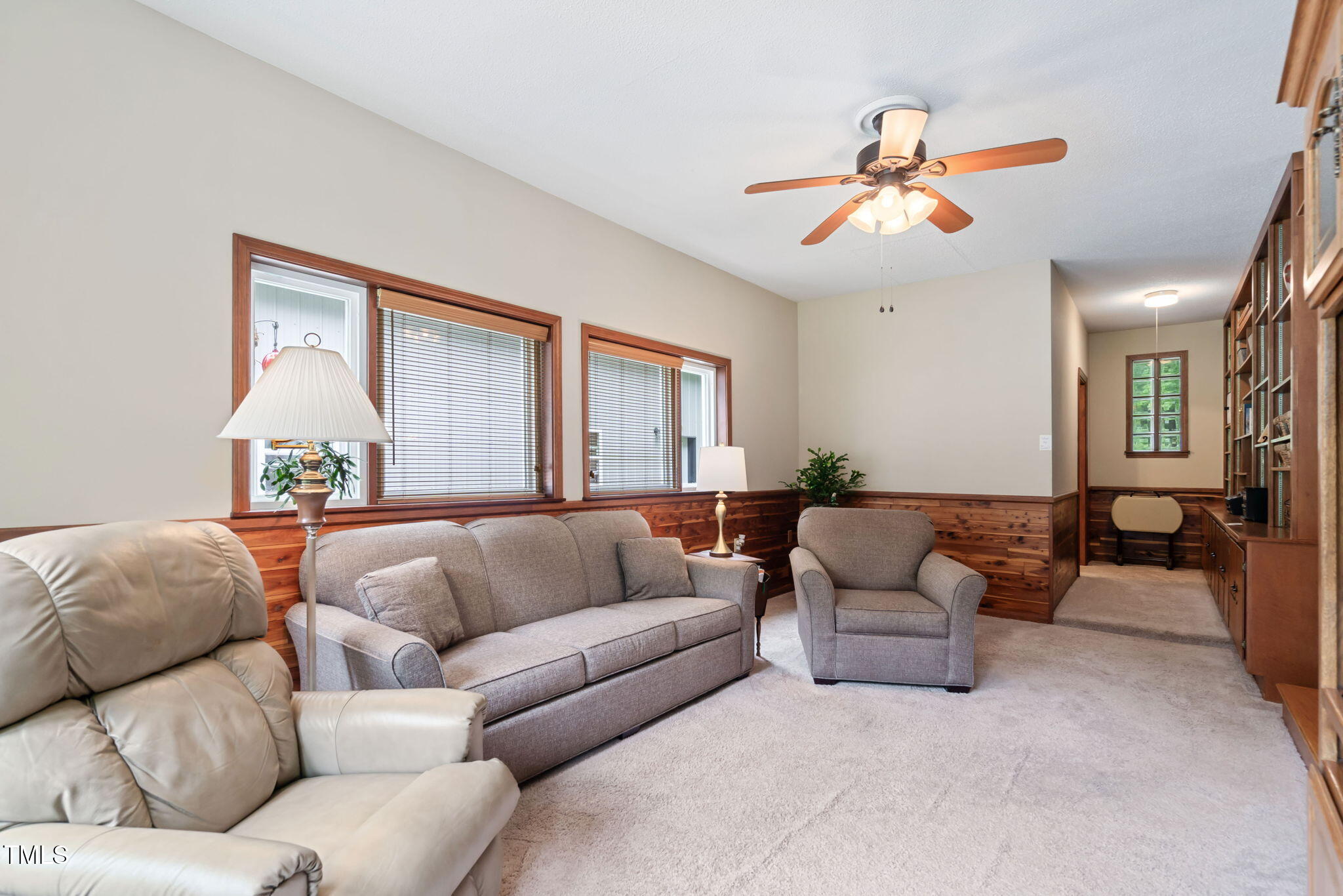8236 Jackson Road Wake Forest, NC 27587 - Photo 21 of 74 a living room with furniture and a large window