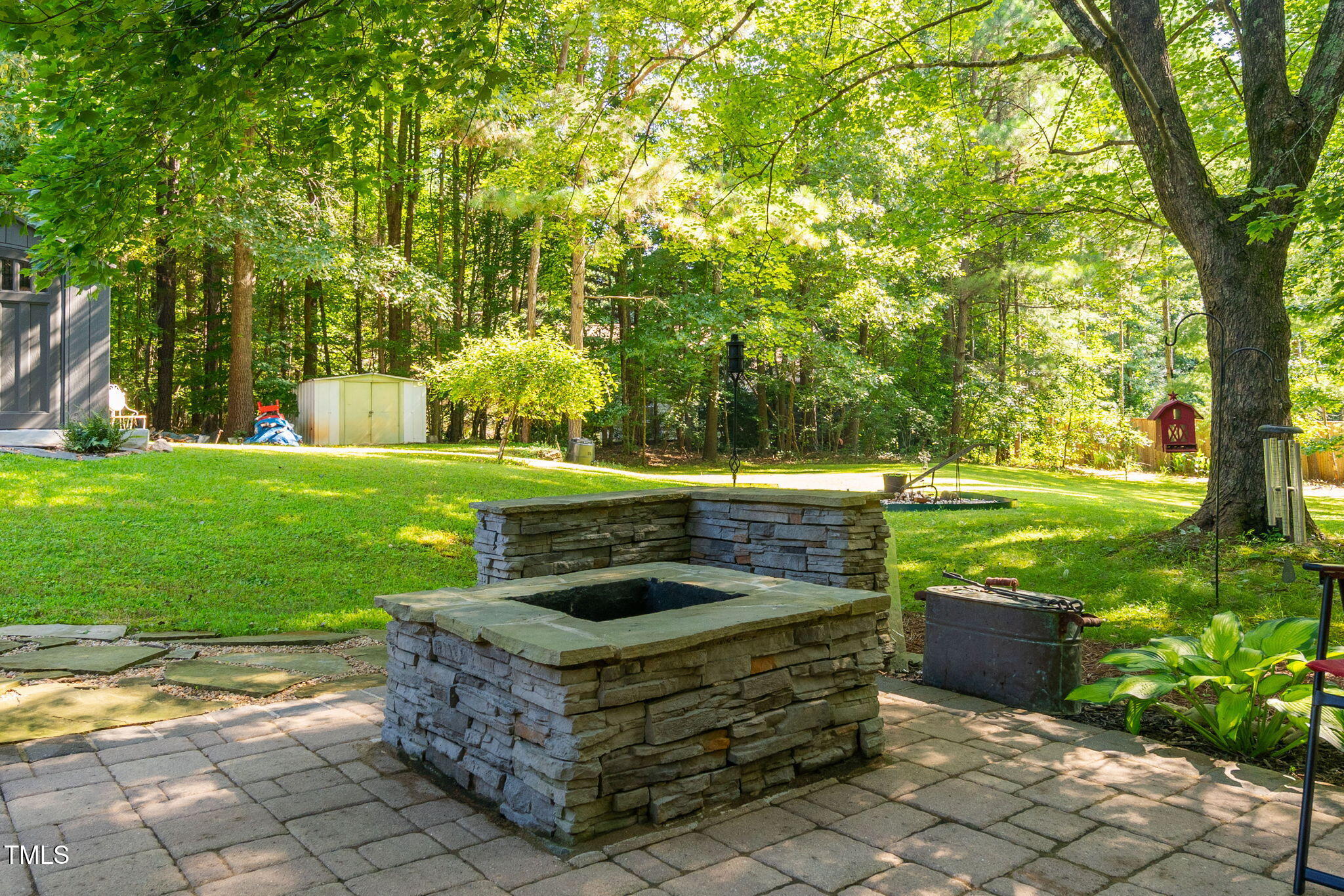 8236 Jackson Road Wake Forest, NC 27587 - Photo 41 of 74 a view of a garden with an outdoor space