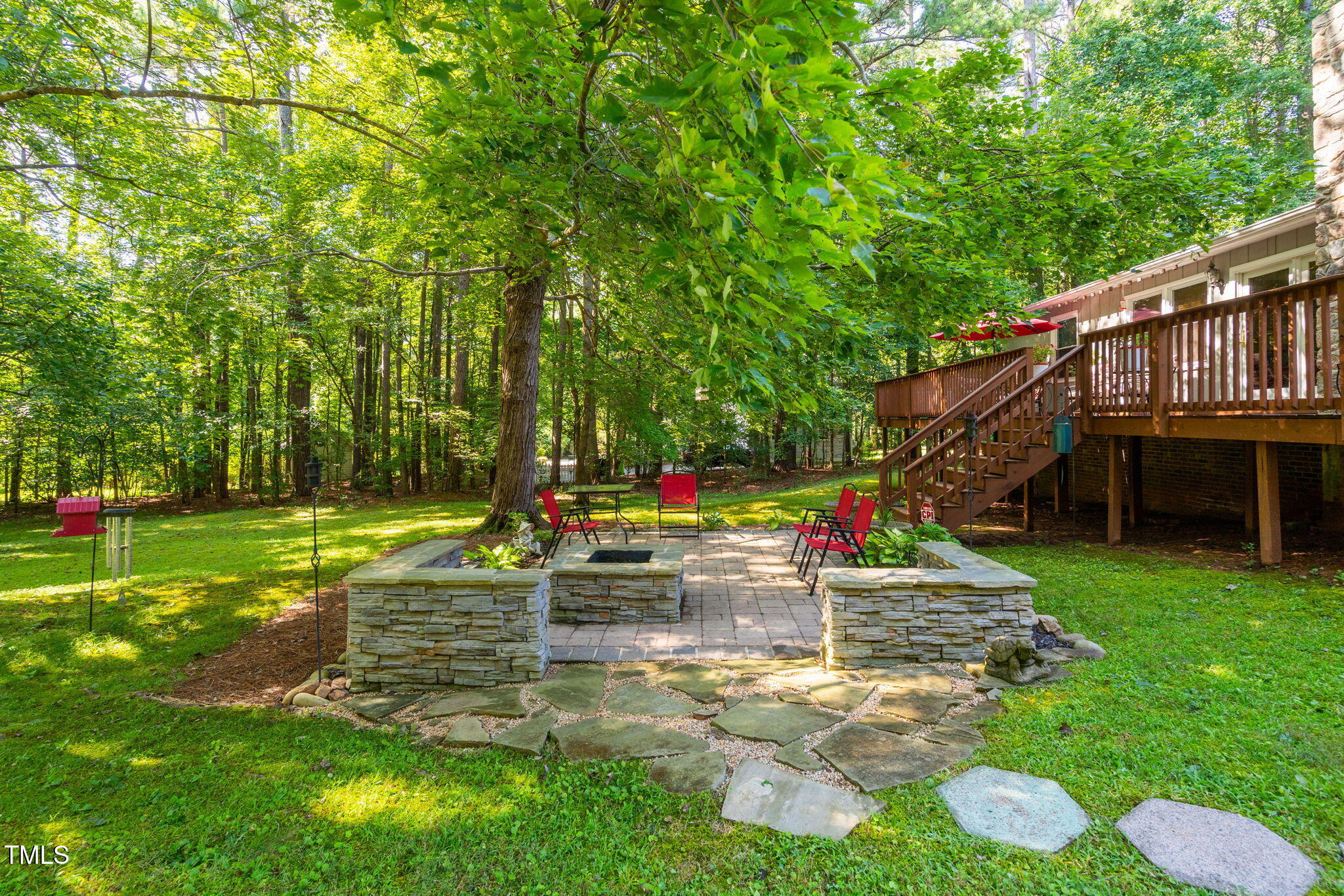 8236 Jackson Road Wake Forest, NC 27587 - Photo 43 of 74 a view of a house with a yard patio and fire pit