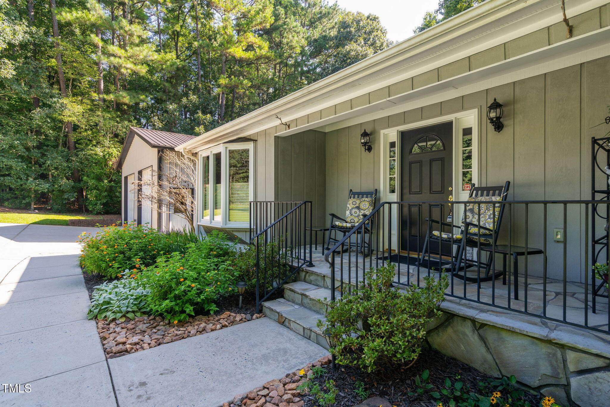 8236 Jackson Road Wake Forest, NC 27587 - Photo 4 of 74 a view of a house with backyard and sitting area