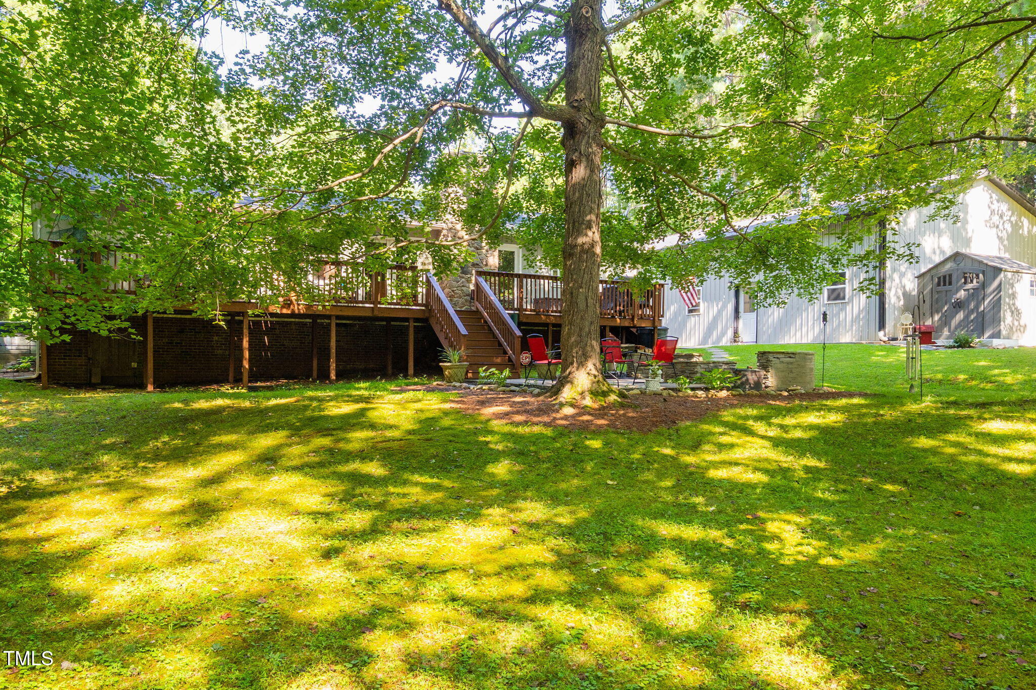 8236 Jackson Road Wake Forest, NC 27587 - Photo 61 of 74 a view of a house with swimming pool and a large tree