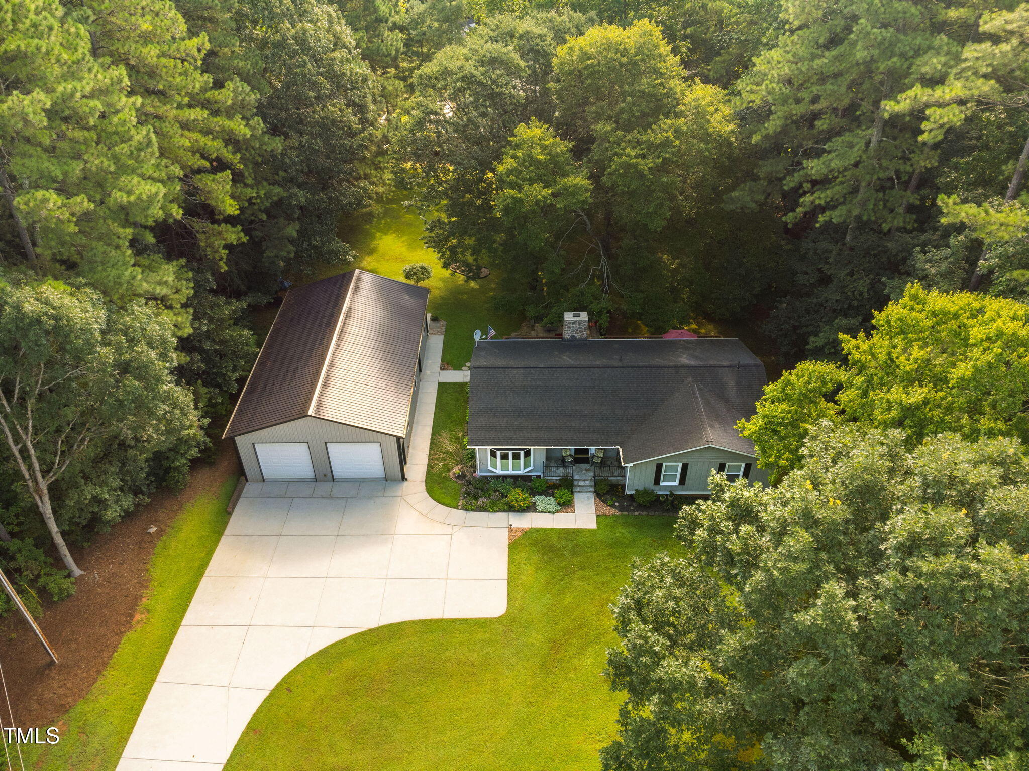 8236 Jackson Road Wake Forest, NC 27587 - Photo 66 of 74 a view of a swimming pool with a patio and a yard