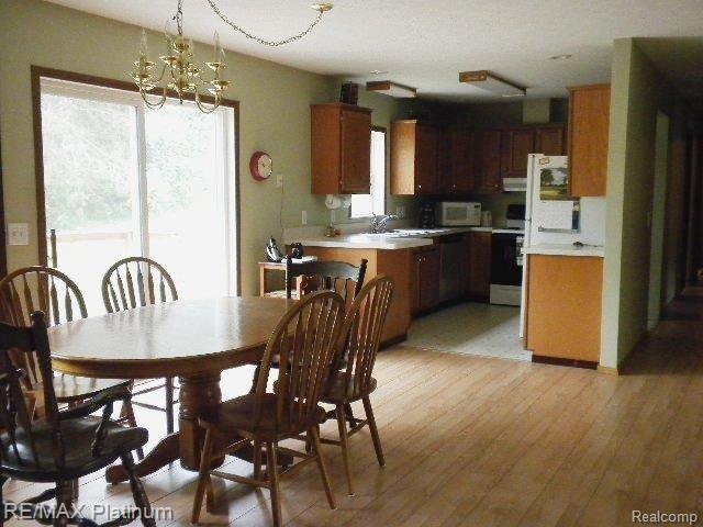 5493 West Coon Lake Road Howell, MI 48843 - Photo 11 of 19 Dining Room & Kitchen