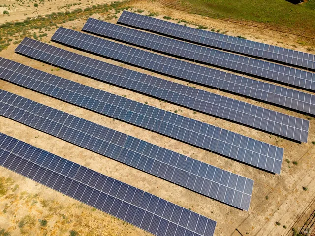a view of swimming pool with outdoor seating