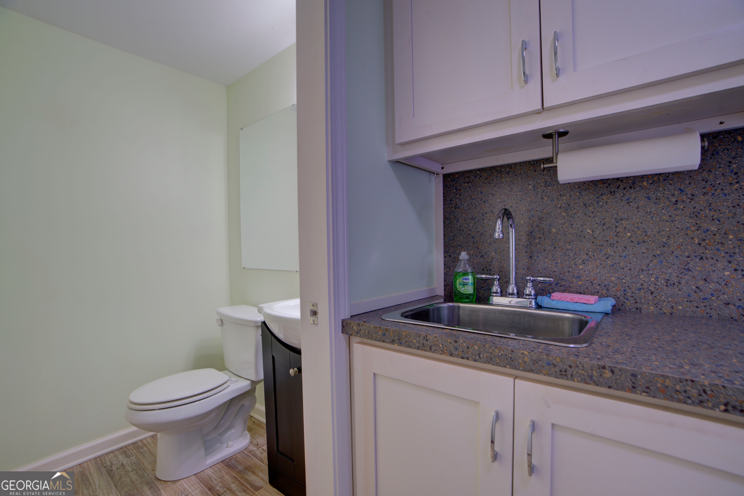 610 Kings Bridge Road Cave Spring, GA 30124 - Photo 65 of 72 a bathroom with a toilet and a sink