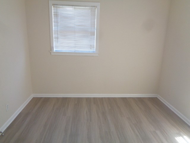 620 Grantham Road Baytown, TX 77521 - Photo 4 of 17 an empty room with a window