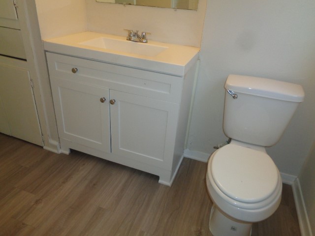 620 Grantham Road Baytown, TX 77521 - Photo 6 of 17 a white toilet sitting next to a bathroom sink