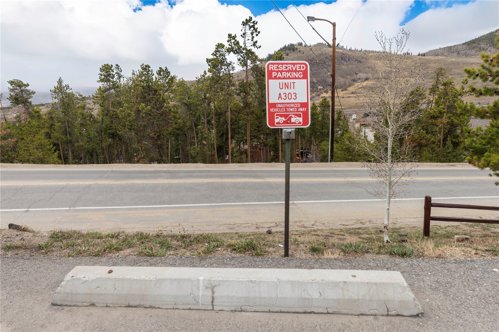 110 Evergreen Road, Unit 303 Dillon, CO 80435 - Photo 24 of 35 a sign that is on the side of a road