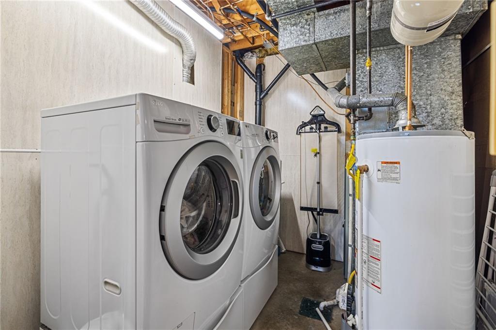75 Fawnvue Drive McKees Rocks, PA 15136 - Photo 35 of 46 a utility room with dryer and washer