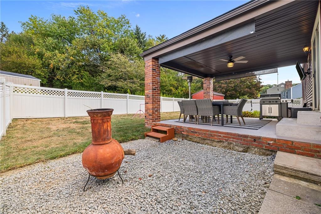 75 Fawnvue Drive McKees Rocks, PA 15136 - Photo 38 of 46 a view of a backyard with sitting area