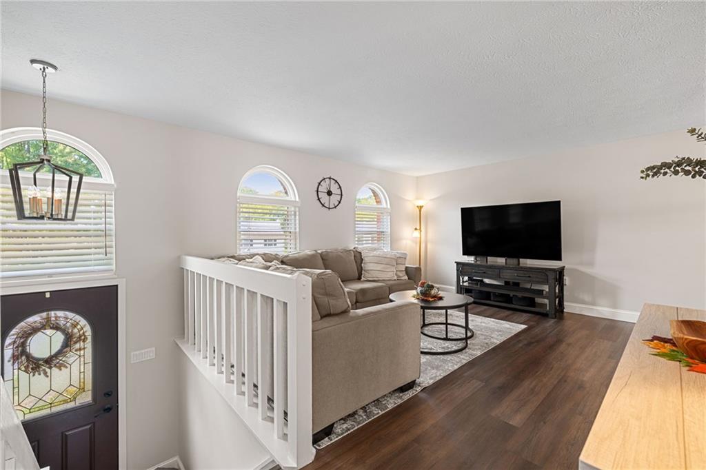 75 Fawnvue Drive McKees Rocks, PA 15136 - Photo 5 of 46 a living room with furniture and a flat screen tv