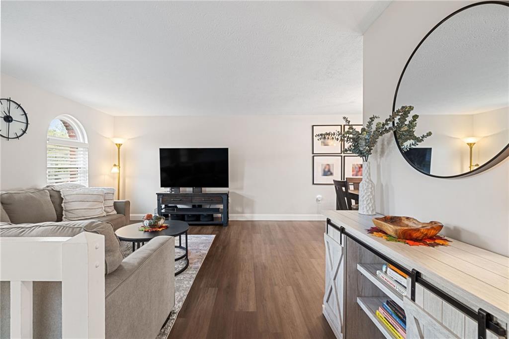 75 Fawnvue Drive McKees Rocks, PA 15136 - Photo 6 of 46 a living room with furniture and a flat screen tv