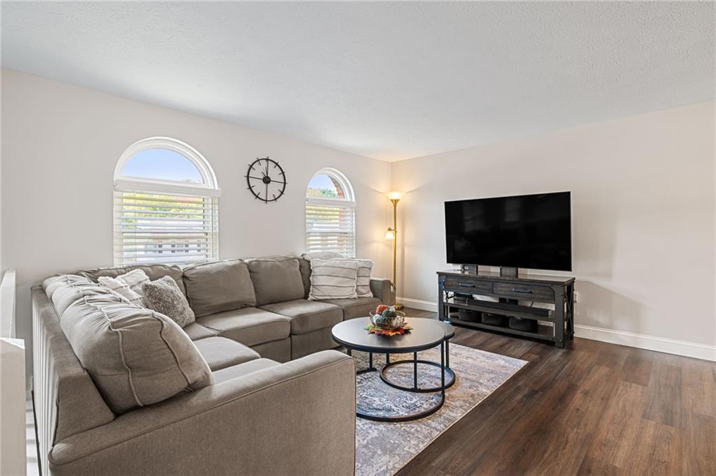 75 Fawnvue Drive McKees Rocks, PA 15136 - Photo 7 of 46 a living room with furniture and a flat screen tv