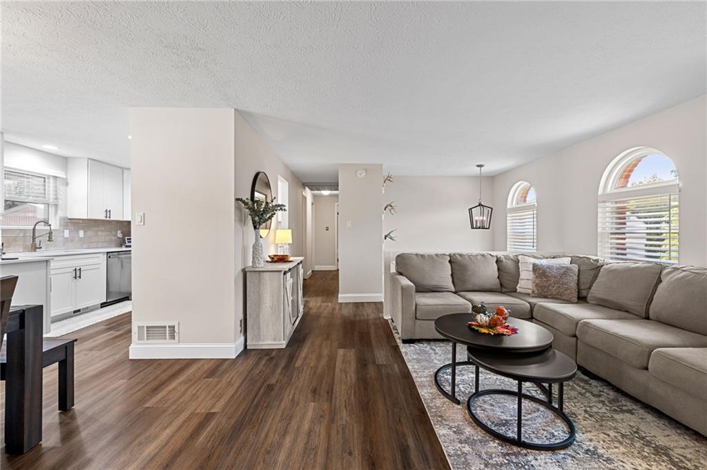 75 Fawnvue Drive McKees Rocks, PA 15136 - Photo 9 of 46 a living room with furniture and a wooden floor