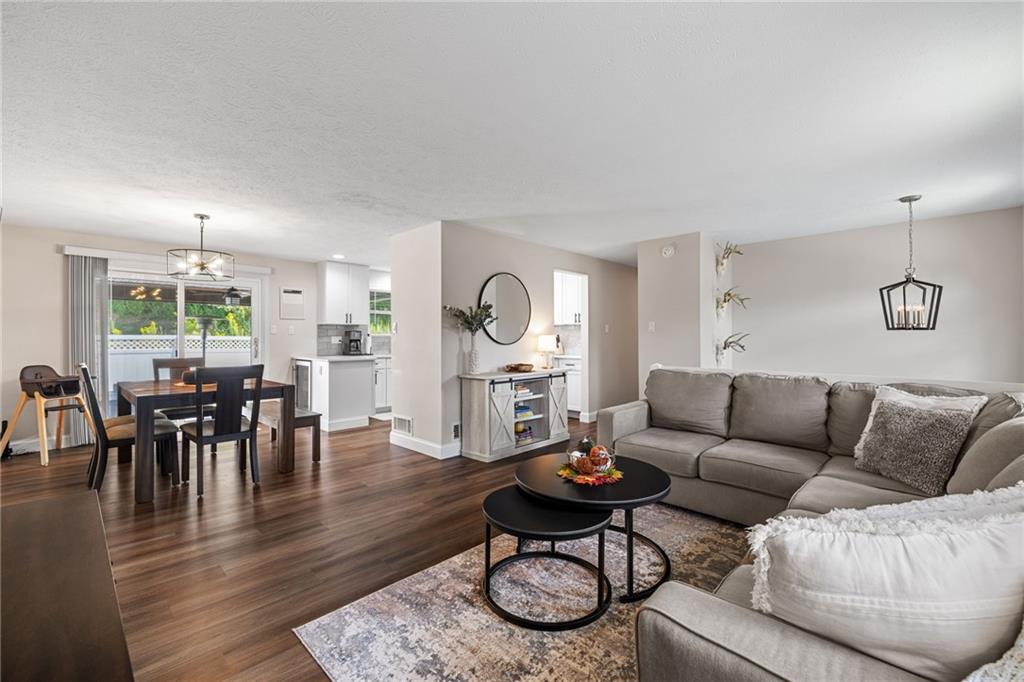 75 Fawnvue Drive McKees Rocks, PA 15136 - Photo 10 of 46 a living room with furniture wooden floor and a window