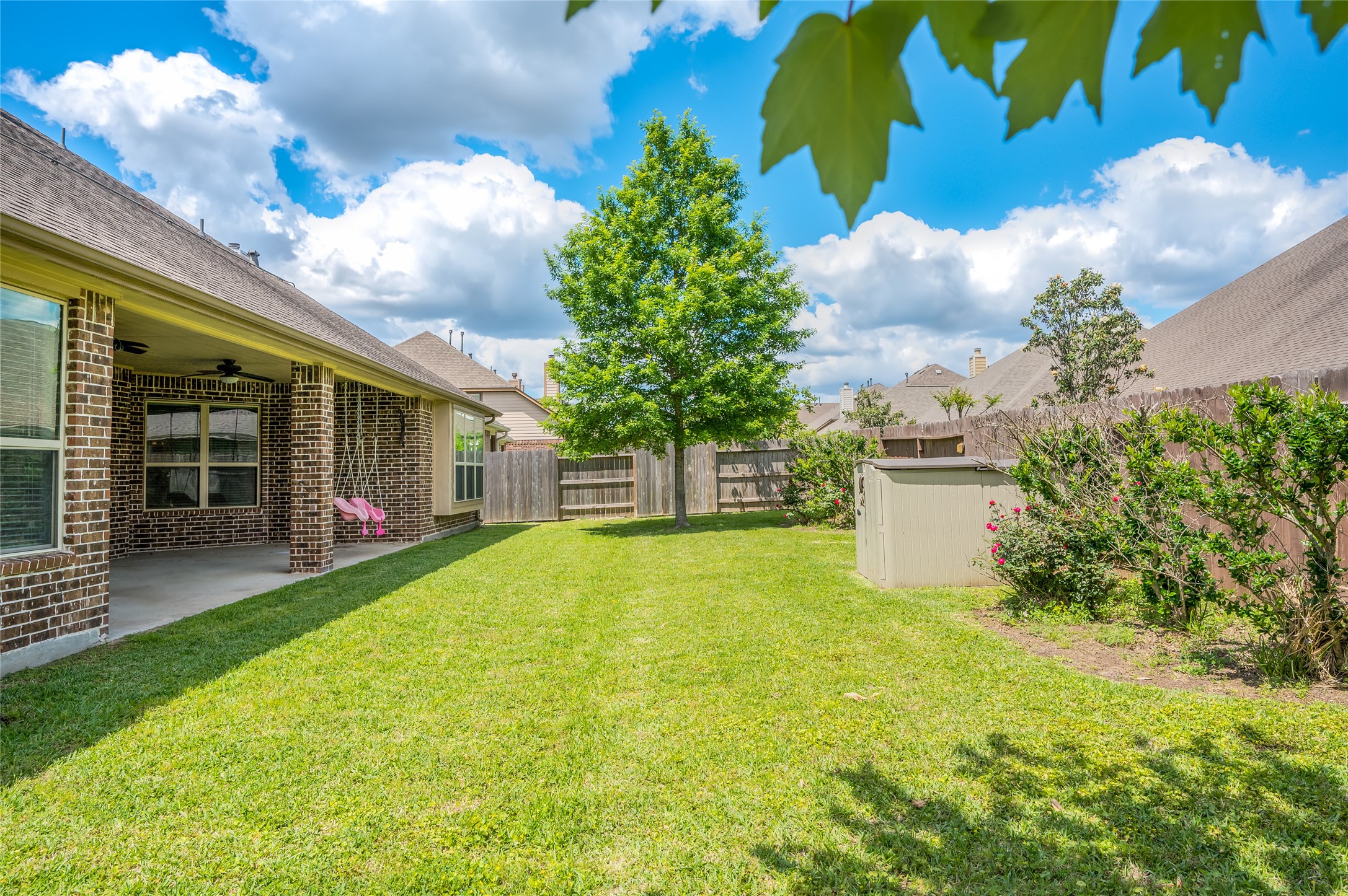 19006 Panther Peak Spring, TX 77388 - Photo 48 of 48 Back yard view with tree that offers plenty of shade.