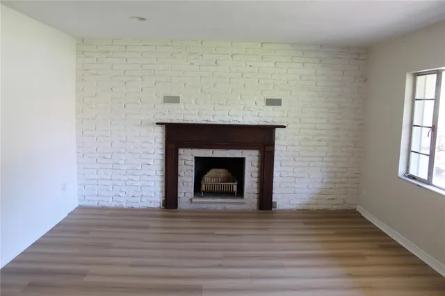 a view of a livingroom with a fireplace