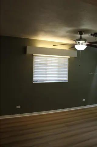 a view of a livingroom with wooden floor