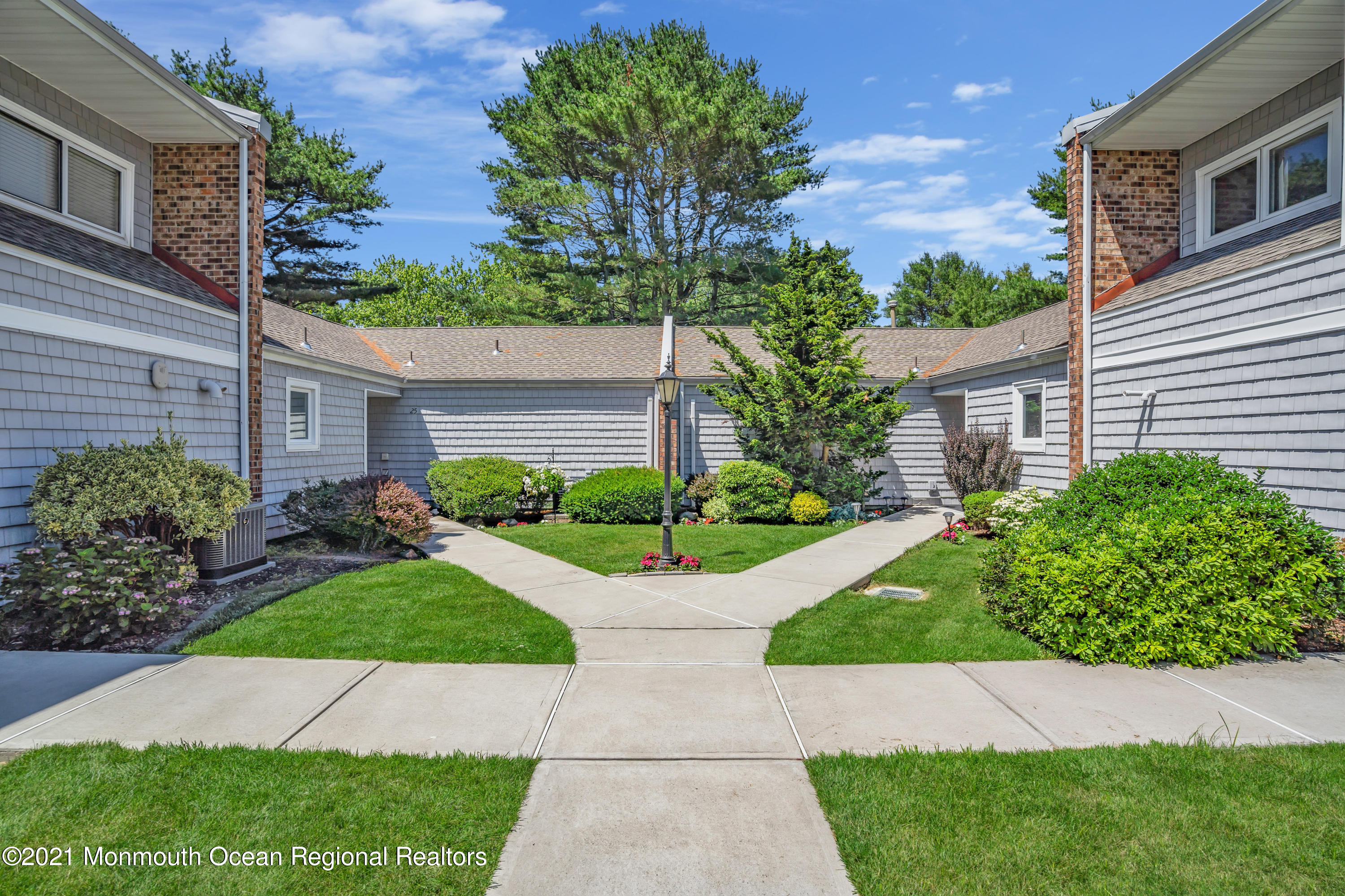 27 Locust Way Spring Lake Heights, NJ 07762 - Photo 3 of 43 a view of a house with a garden