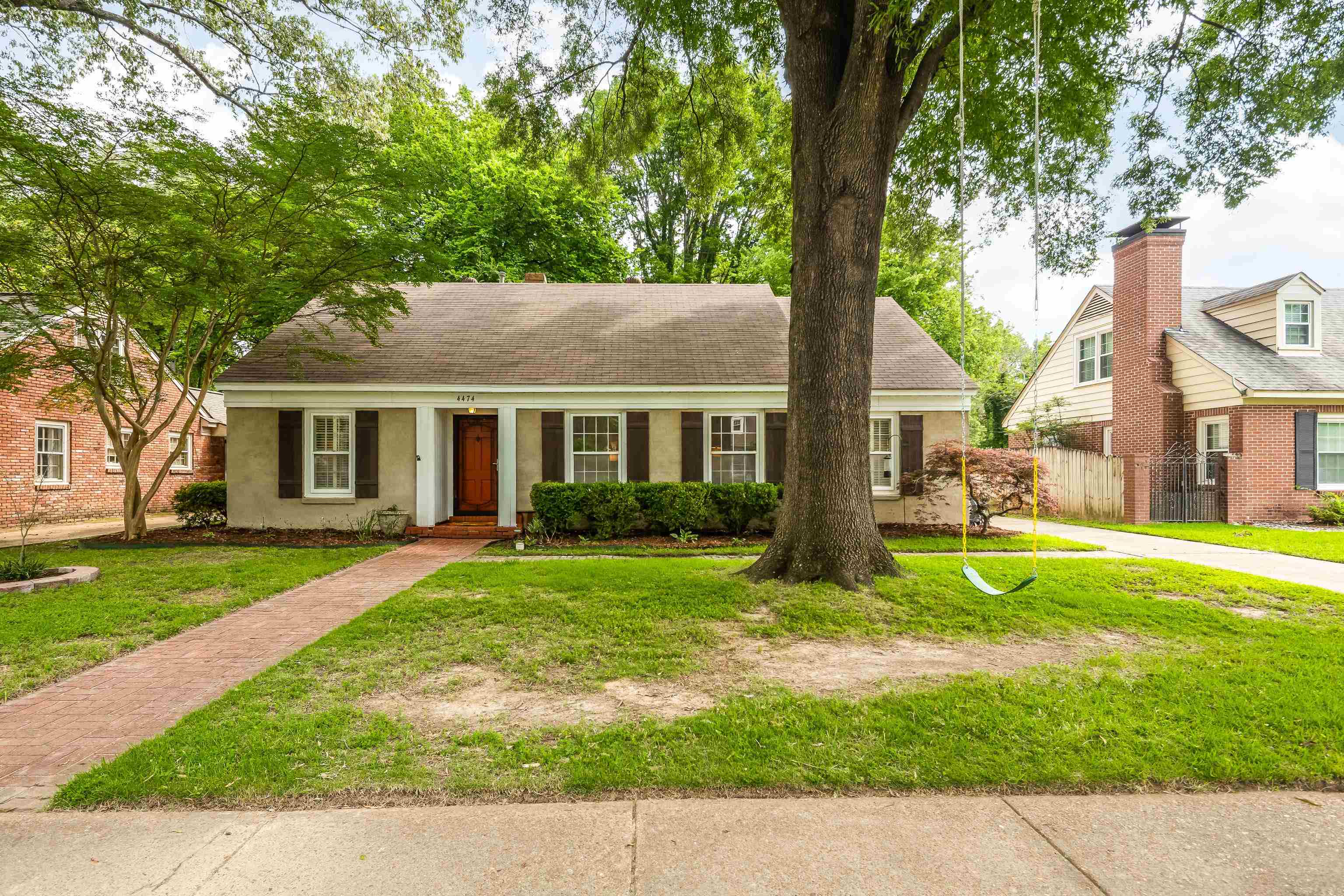 4474 Cherrydale Road Memphis, TN 38117 - Photo 1 of 35 front view of a house with a yard