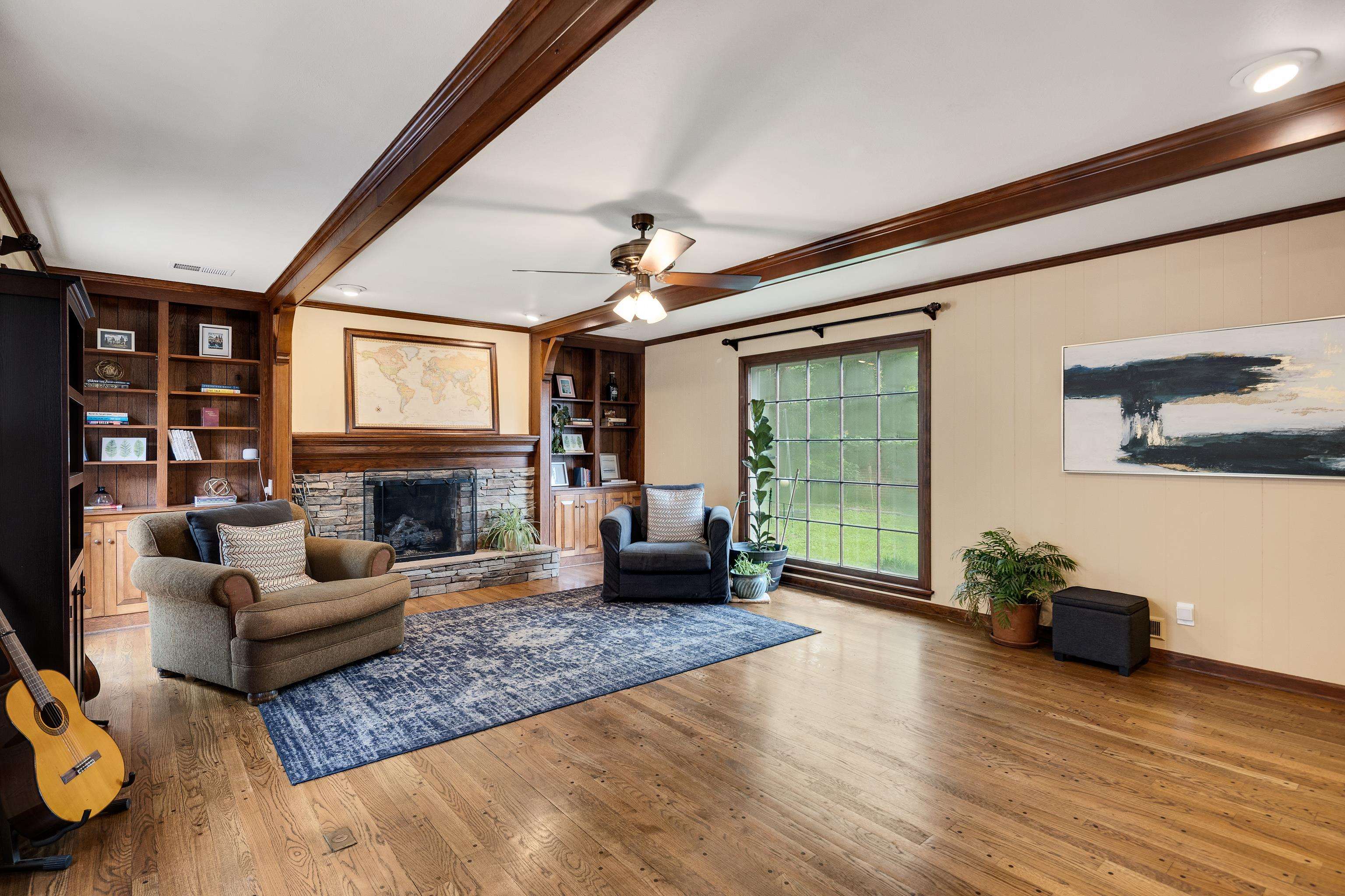 4474 Cherrydale Road Memphis, TN 38117 - Photo 12 of 35 a living room with furniture and a fireplace