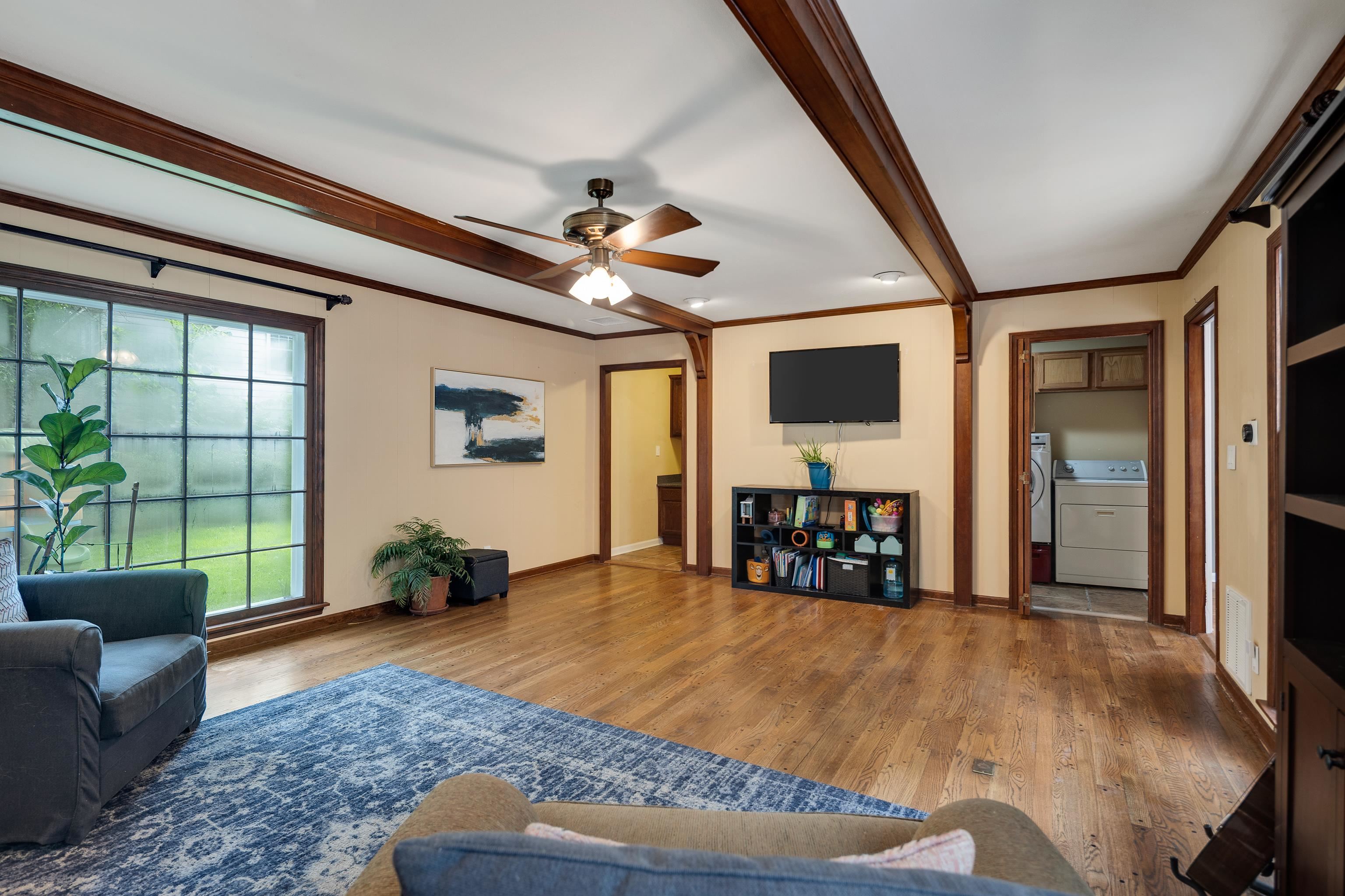 4474 Cherrydale Road Memphis, TN 38117 - Photo 14 of 35 a living room with furniture and a flat screen tv