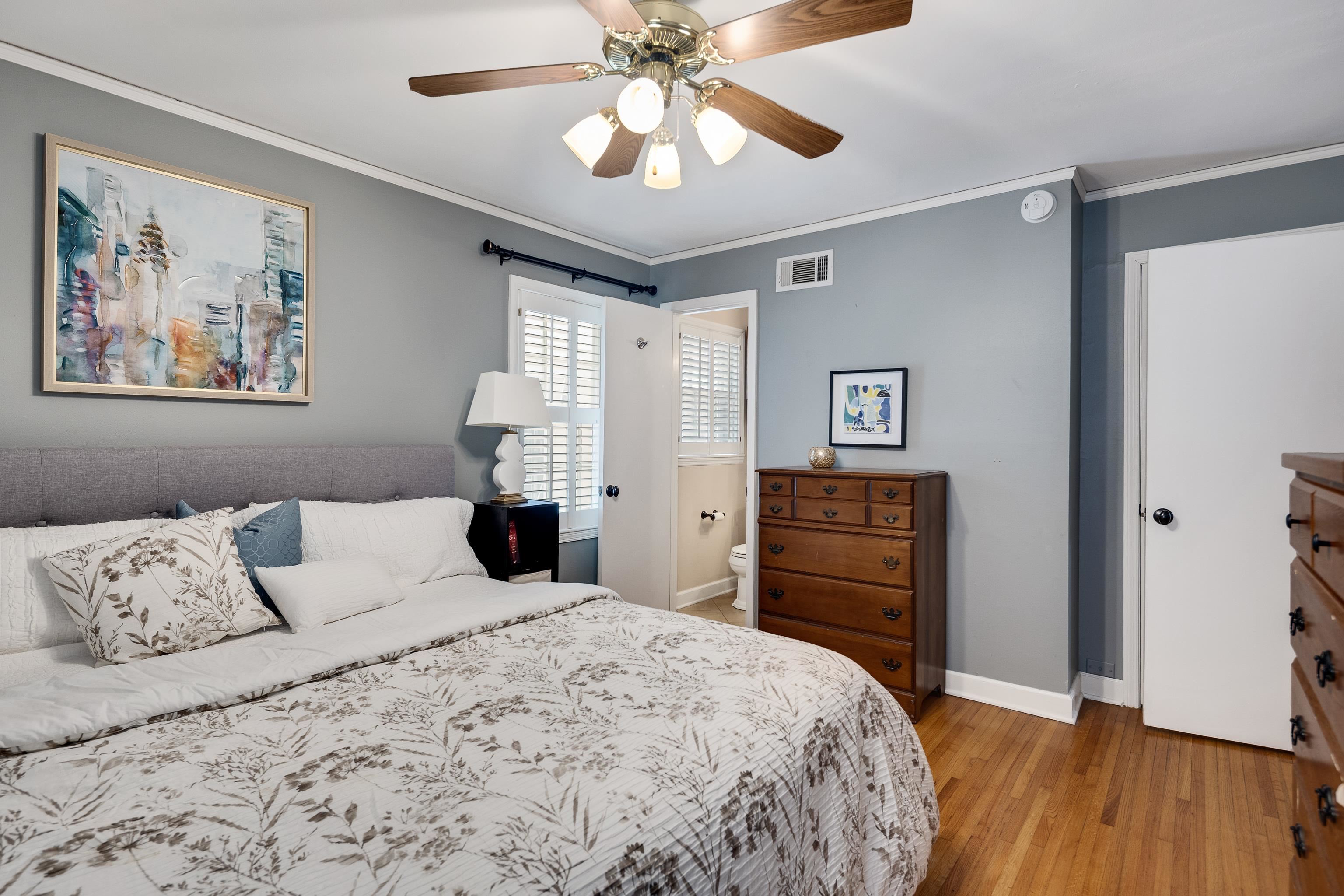 4474 Cherrydale Road Memphis, TN 38117 - Photo 17 of 35 a bedroom with a bed and wooden floor