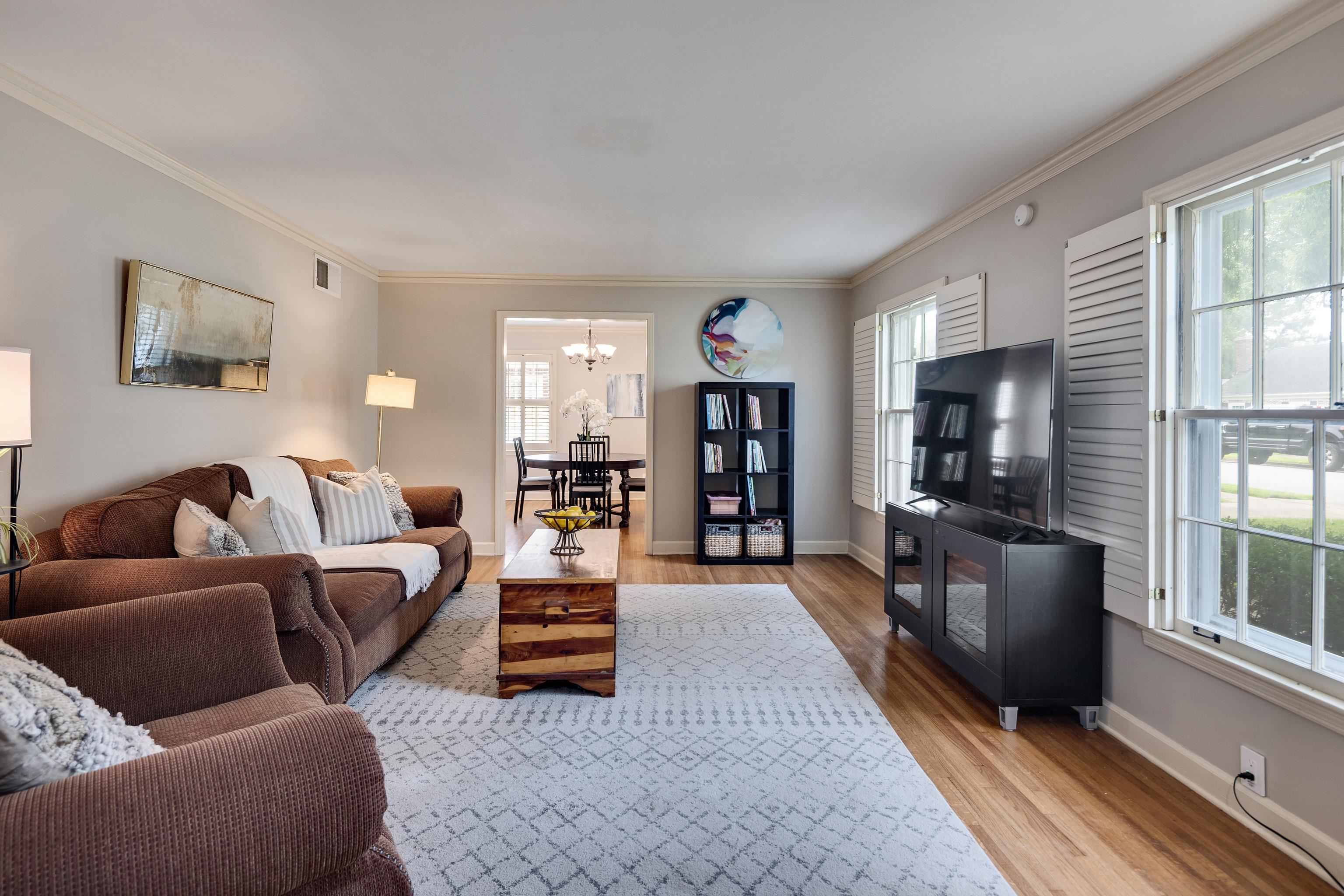 4474 Cherrydale Road Memphis, TN 38117 - Photo 2 of 35 a living room with furniture and a flat screen tv