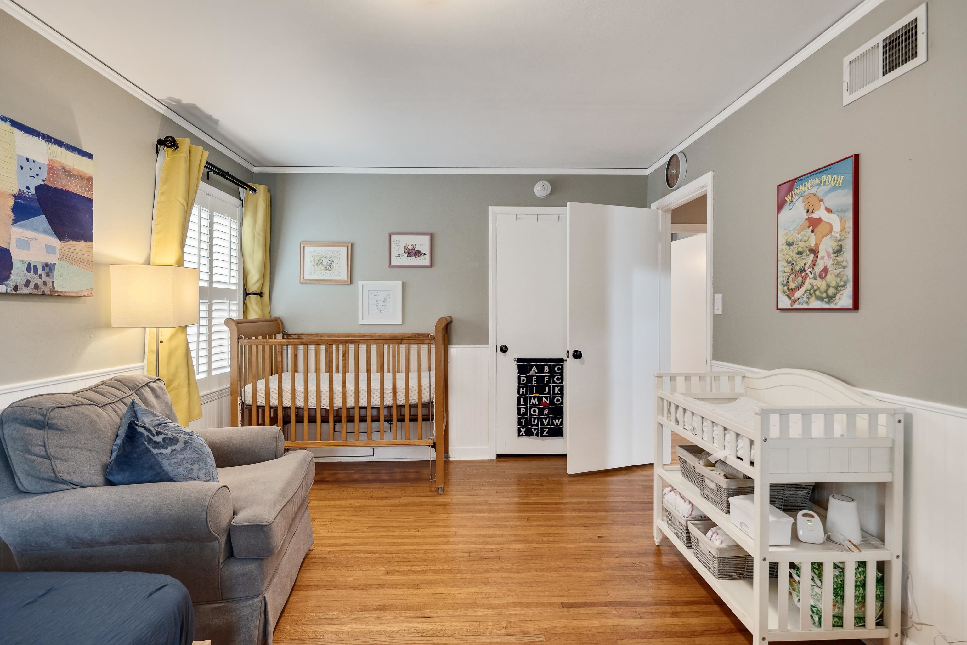 4474 Cherrydale Road Memphis, TN 38117 - Photo 23 of 35 a bedroom with furniture and a wooden floor