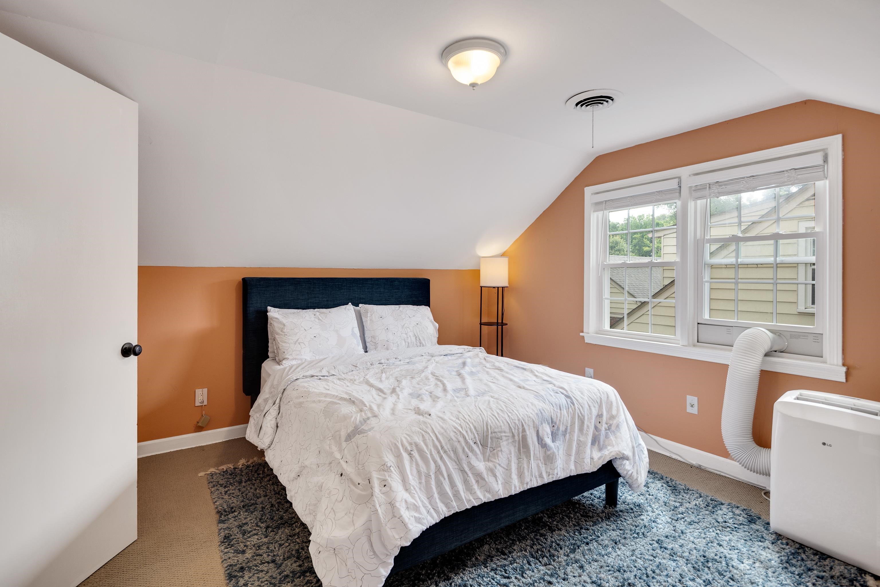 4474 Cherrydale Road Memphis, TN 38117 - Photo 24 of 35 a bedroom with a bed and a large window