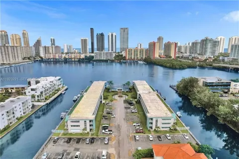 a view of a city with tall buildings