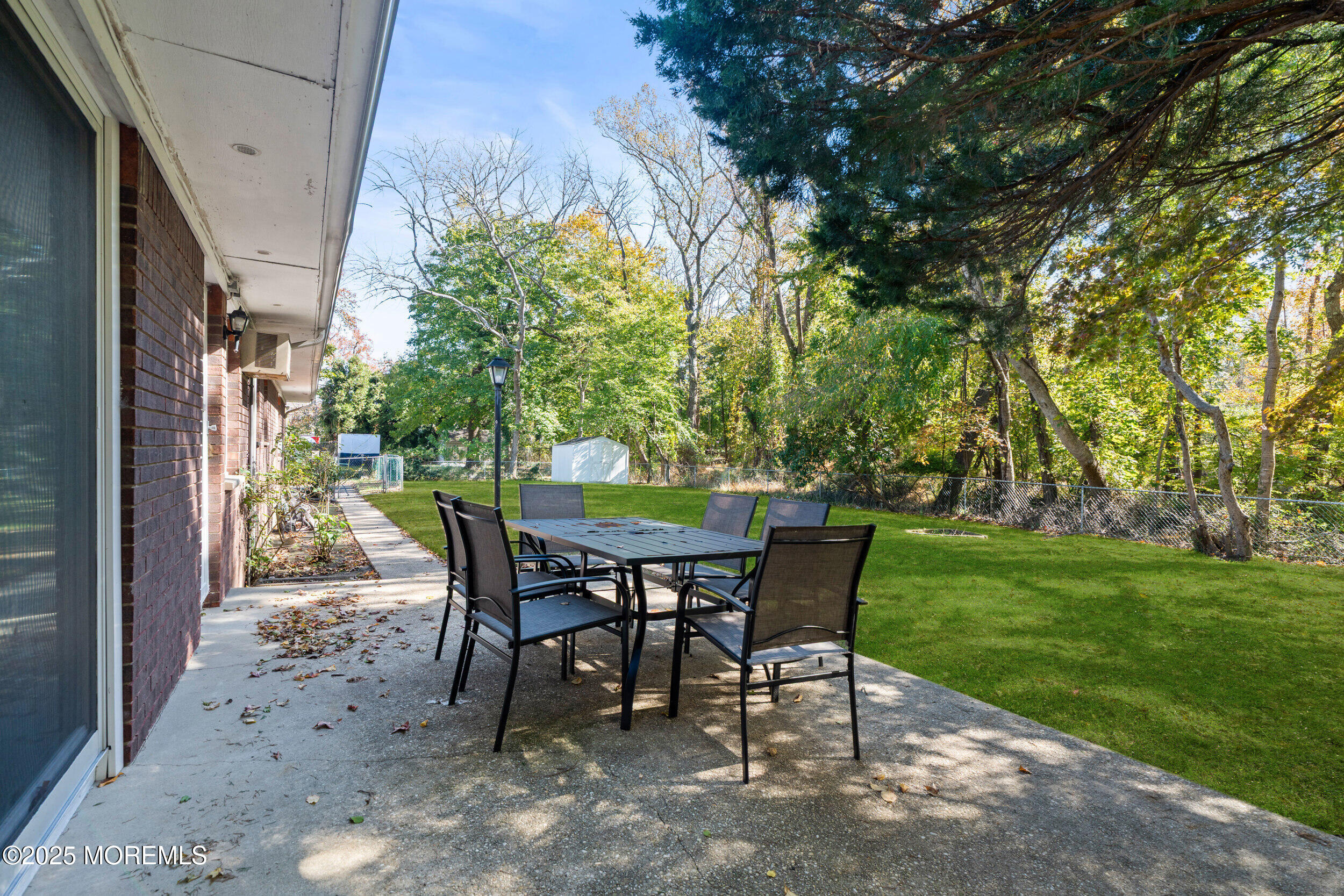 404 Brookside Avenue Oakhurst, NJ 07755 - Photo 30 of 43 a view of a dining room with a table and chairs