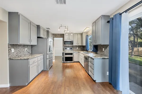 $2,550 | 13233 Briar Hollow Drive, Austin, TX 78729