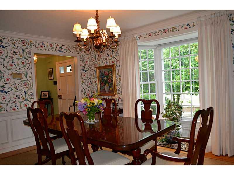 112 Buckingham Road Fox Chapel, PA 15215 - Photo 14 of 25 Dining Room. Crown moulding and a bay window add to the charm of the formal dining room.