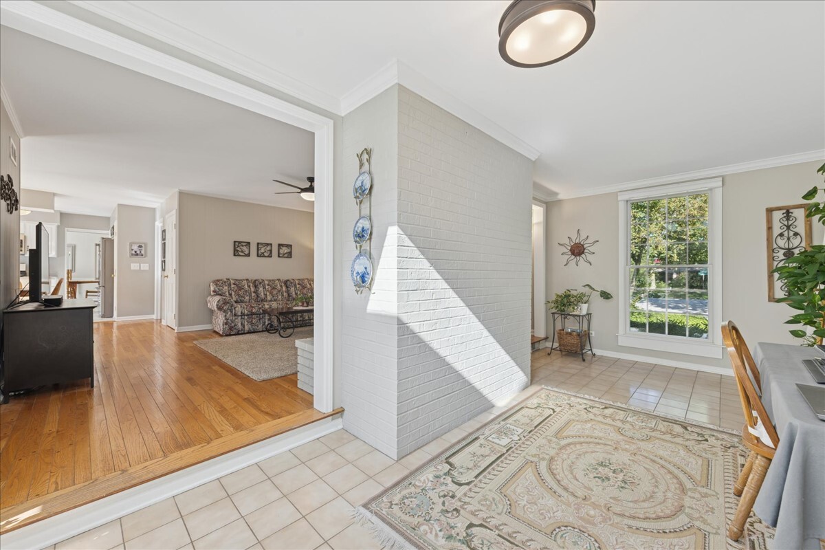 415 Hamilton Drive Wheaton, IL 60189 - Photo 11 of 27 a view of a living room and floor to ceiling window