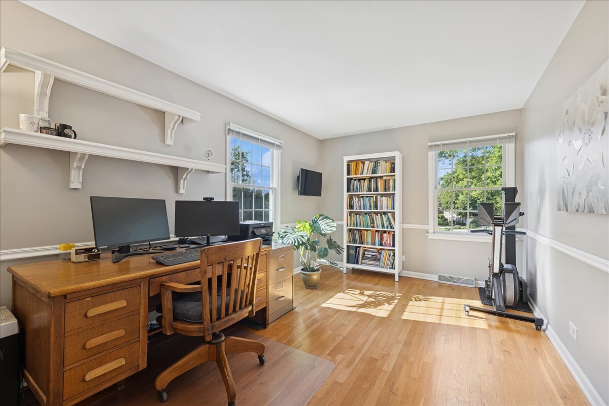 415 Hamilton Drive Wheaton, IL 60189 - Photo 15 of 27 a view of a workspace with furniture and a window