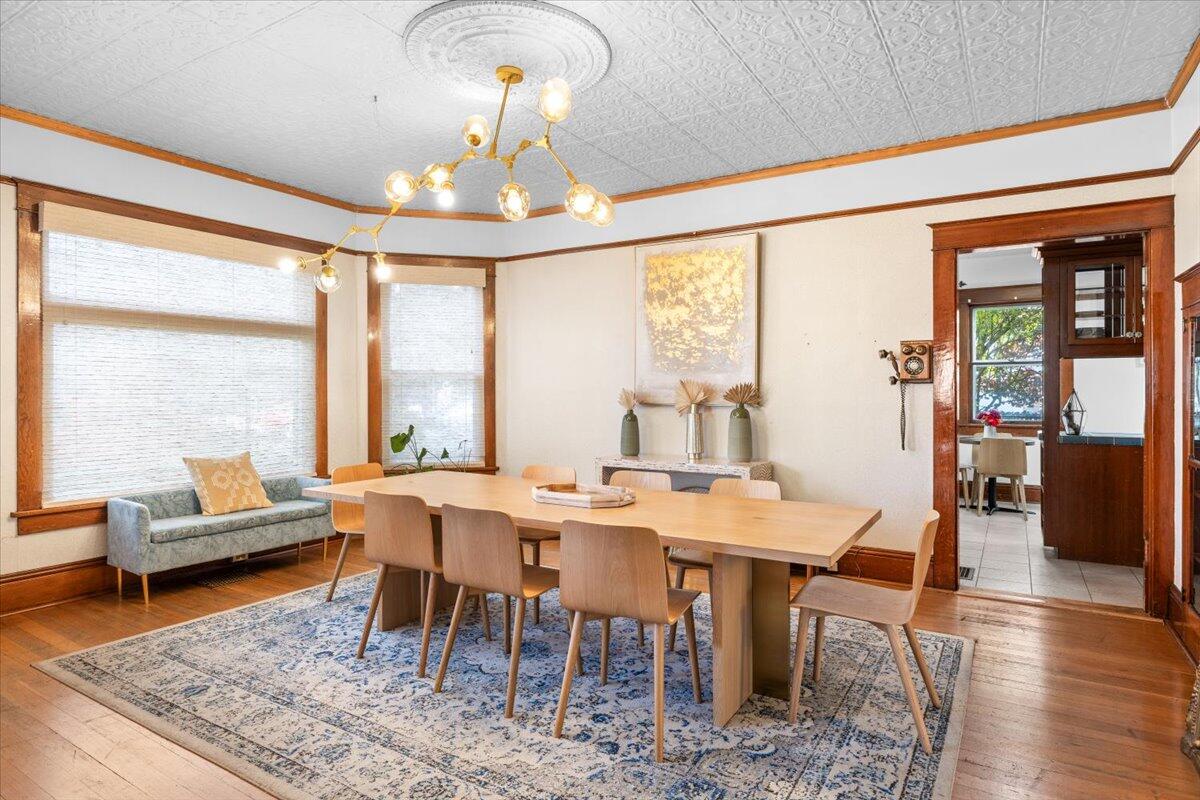 139 Southwest I Street Grants Pass, OR 97526 - Photo 16 of 47 a view of a dining room with furniture window and wooden floor